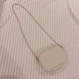 white and gold crossbody